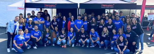 Image of Partners Cast Members in Car Sale