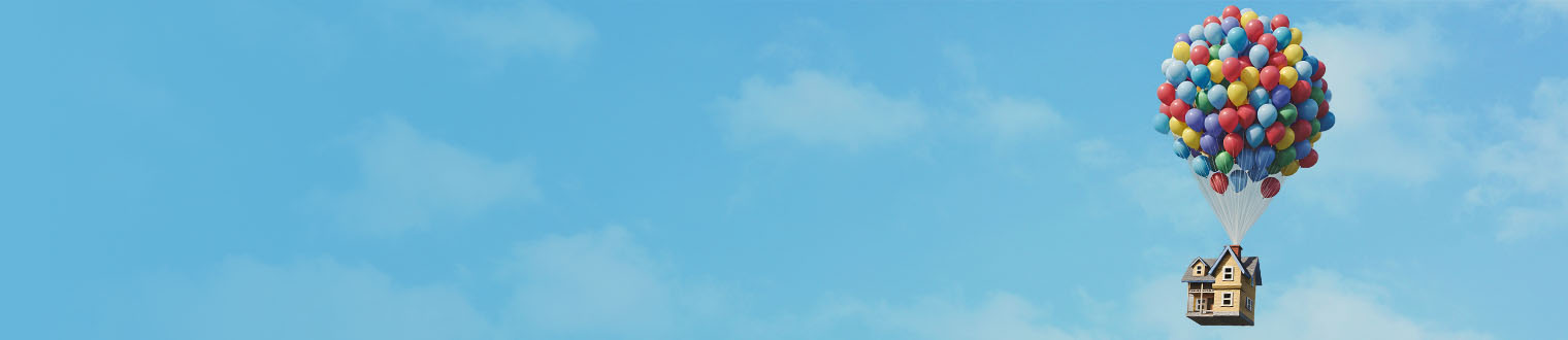 Balloons and house floating in sky