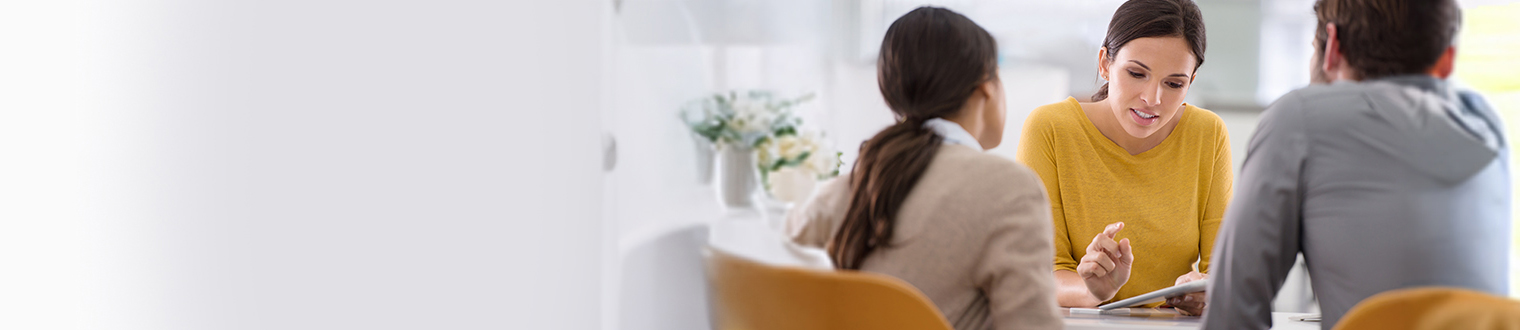 three people talking