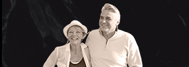 couple smiling looking into the distance