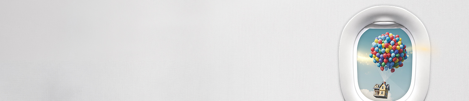 house with balloons in the background